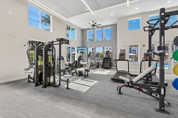 Fitness center with weight machines and cardio equipment